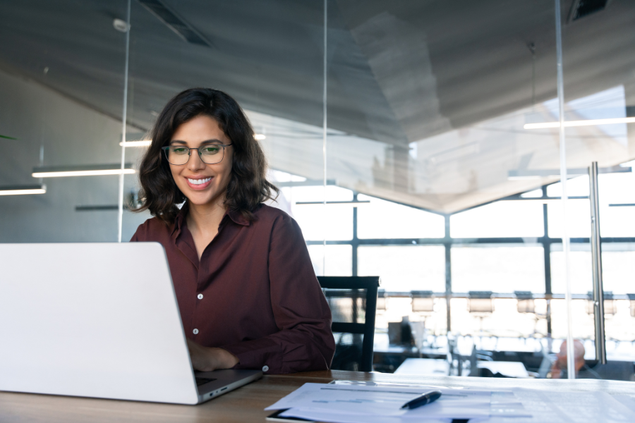 Person at computer in modern office setting