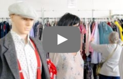 Mannequins in an op shop with a YouTube play button over the top