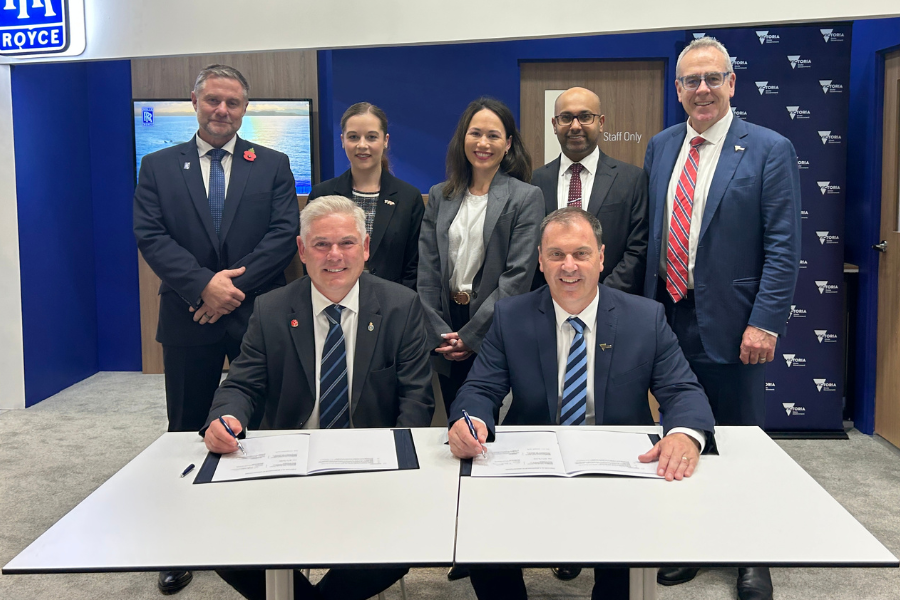 Representatives from the Victorian Government and Rolls-Royce signing a Memoranda of Understanding