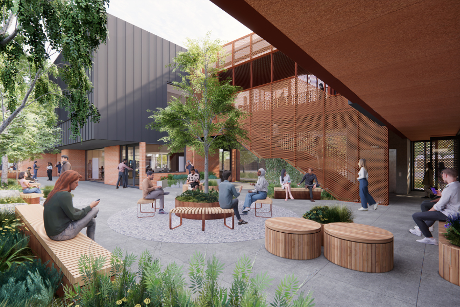 Students will have access to outdoor spaces at the new Sunbury campus. Architectural rendering of a modern outdoor plaza at the new Sunbury campus, featuring students engaged in various activities such as reading and conversing, surrounded by contemporary seating and greenery.