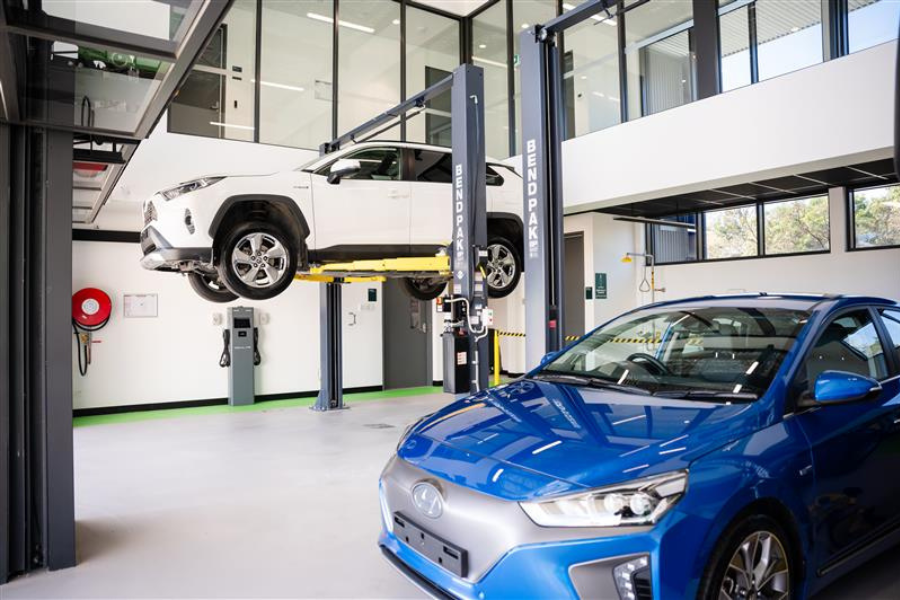 Cars being serviced at the TAFE Gippsland Clean Energy Centre