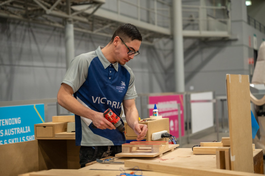 Arif working with wood