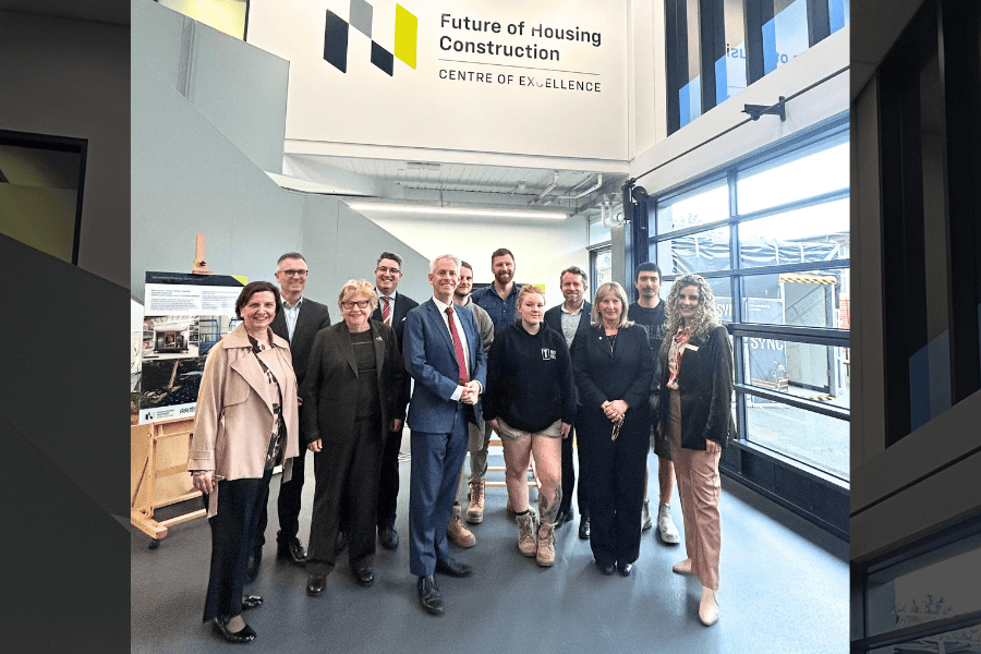 A group of Melbourne Polytechnic students and staff in the Future of Housing Centre of Excellence