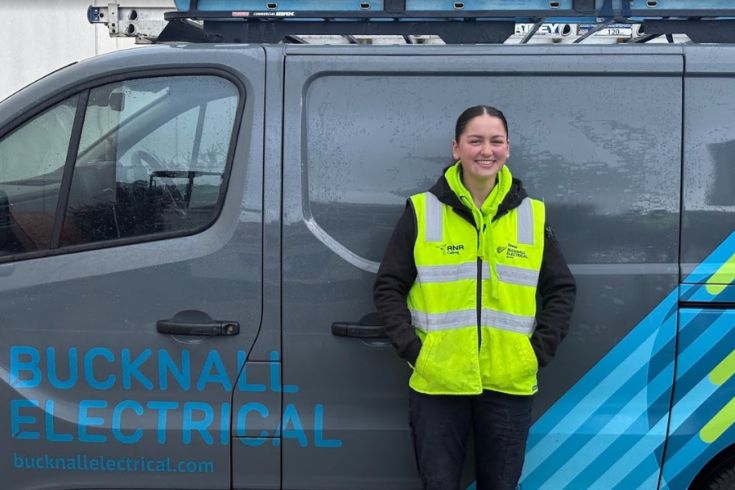Emma Middleton standing next to a van branded “Bucknall Electrical
