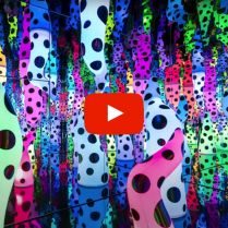 View of the Kusama immersive and colourful artwork with youtube play button