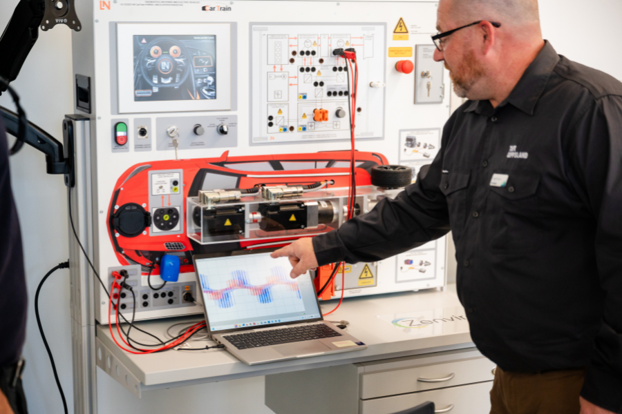 Person pointing to training equipment