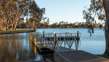 Image of the boat jetty at Lake Lascelles with the lake in the background