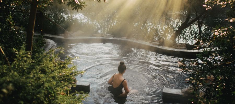 Image of a woman in the hot springs at Metung