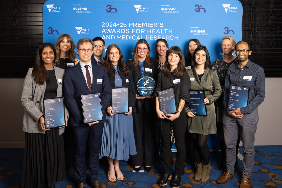 Group of individuals standing with awards at the 2024-25 Premier's Awards for Health and Medical Research event.