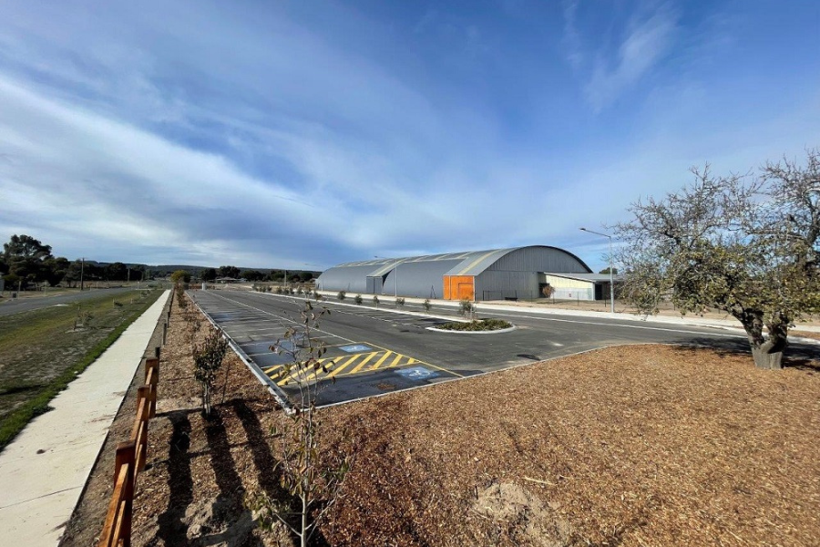Events and Exhibition Centre in background of a carpark with vast sky