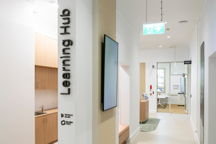 Hallway with 'Learning Hub' written on wall.