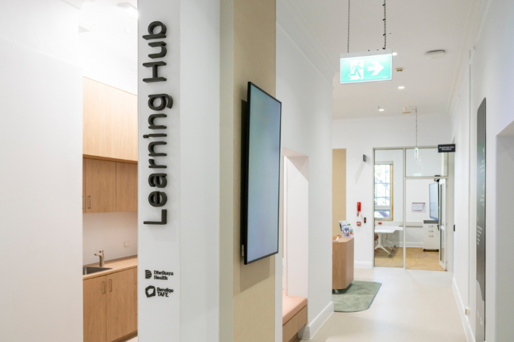 Hallway with 'Learning Hub' written on wall.