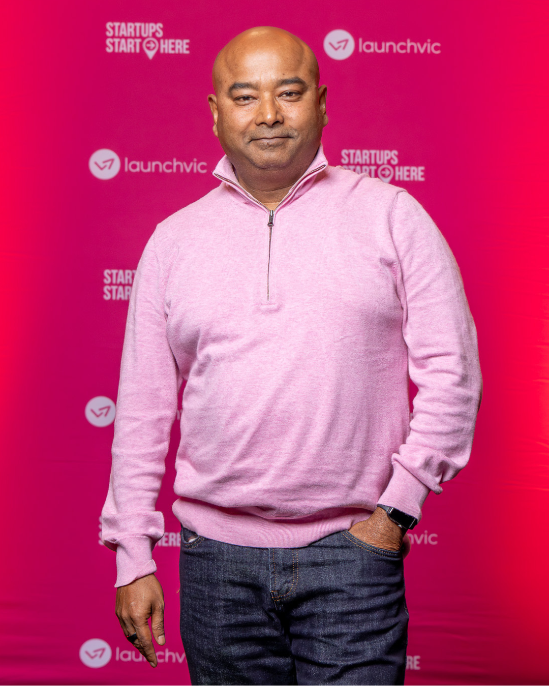 Sushanta Das from tRetail Labs&rsquo; nrtureAI posing in front of LaunchVic banner